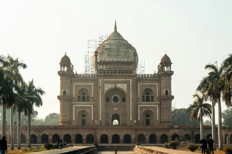 a view of a large, old looking building in india