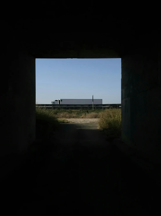 a train is passing through a tunnel that is dark