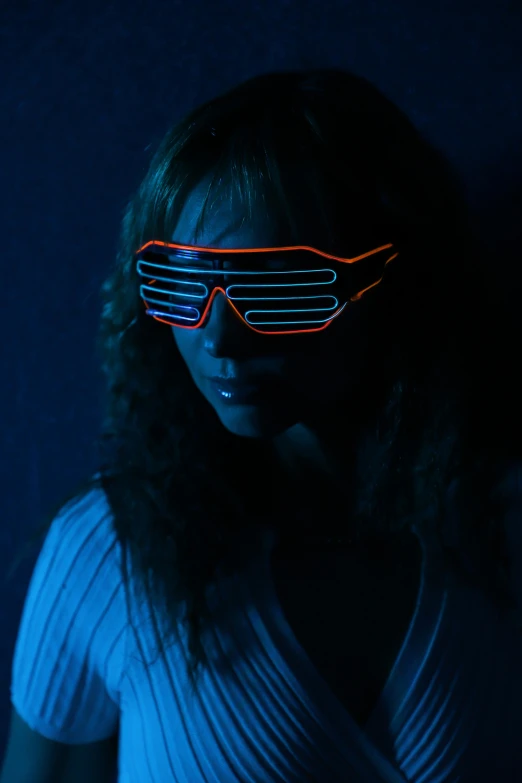 a woman with glasses that have glowing glasses on