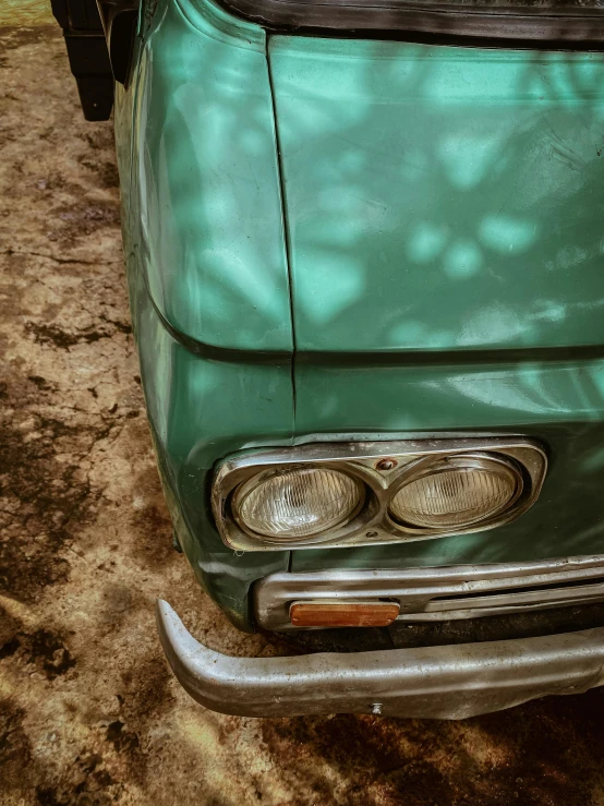 closeup of the front light of a parked car