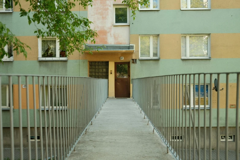 the metal railing surrounding the door on the building