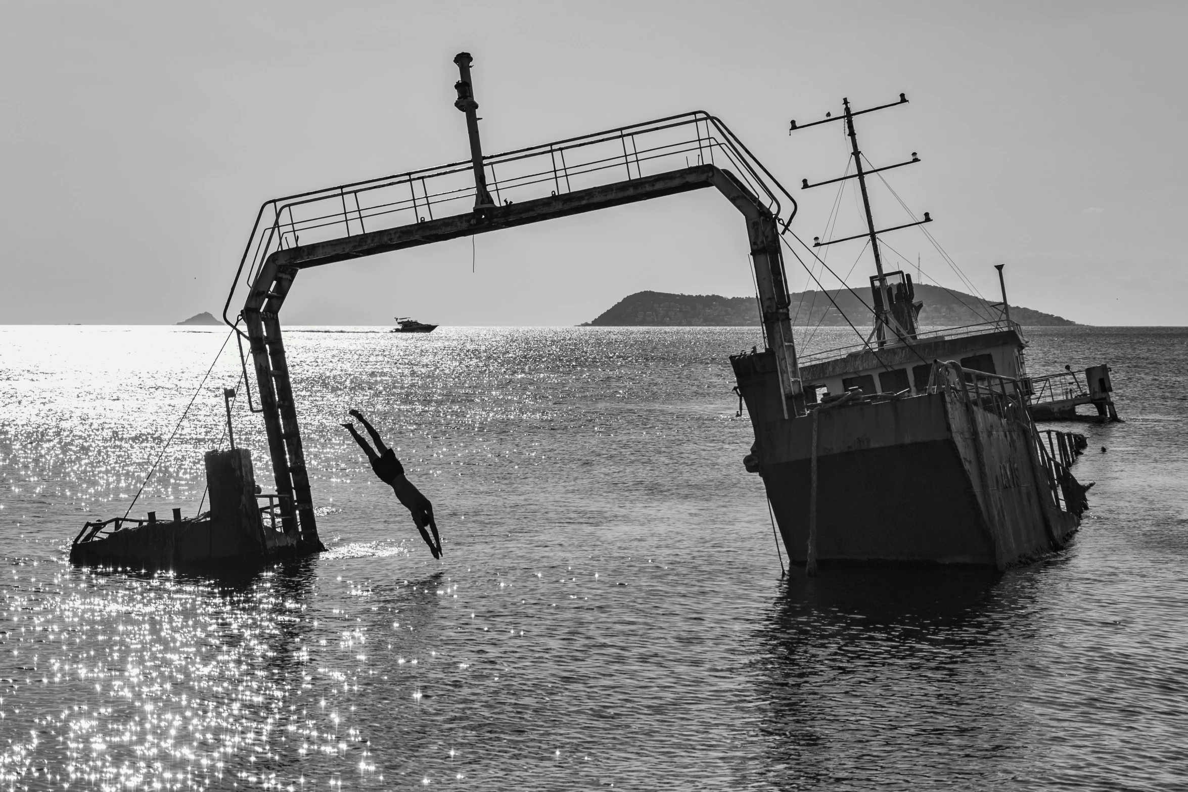 the large boat is docked in the water