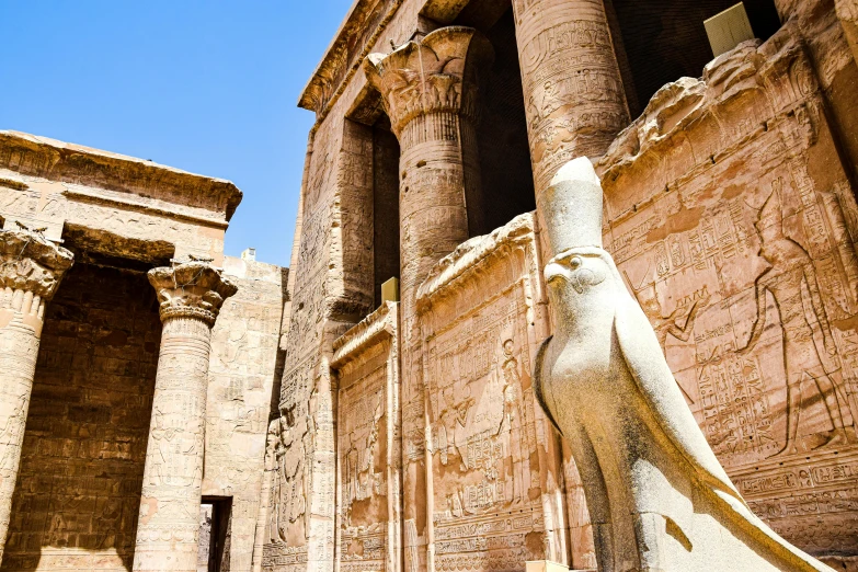 ancient ruins are seen against a clear blue sky