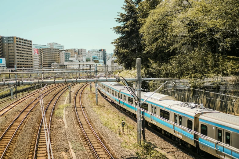 a train on a track near some trees