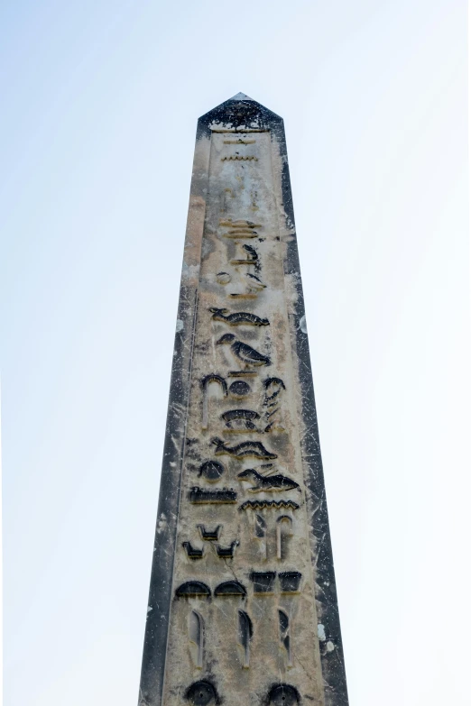 an old stone tower with roman writing on it