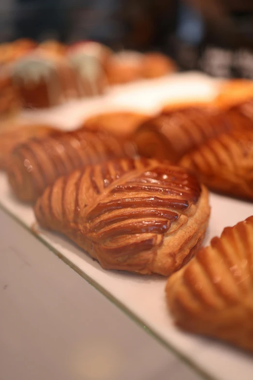 several sweet pastries on display on a counter