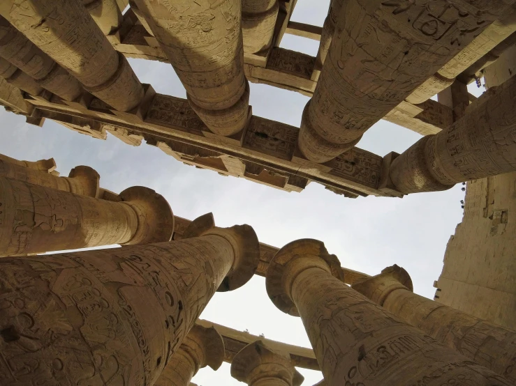 the view from beneath an elaborately carved pillar