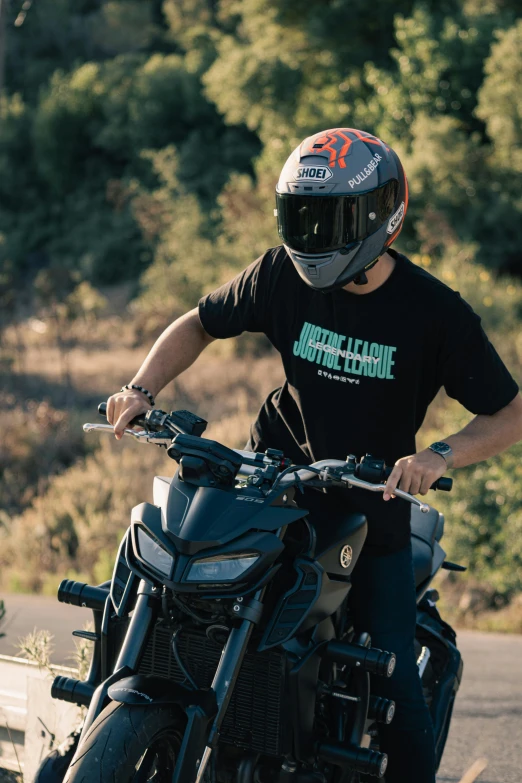 a man in a helmet is on a motorcycle