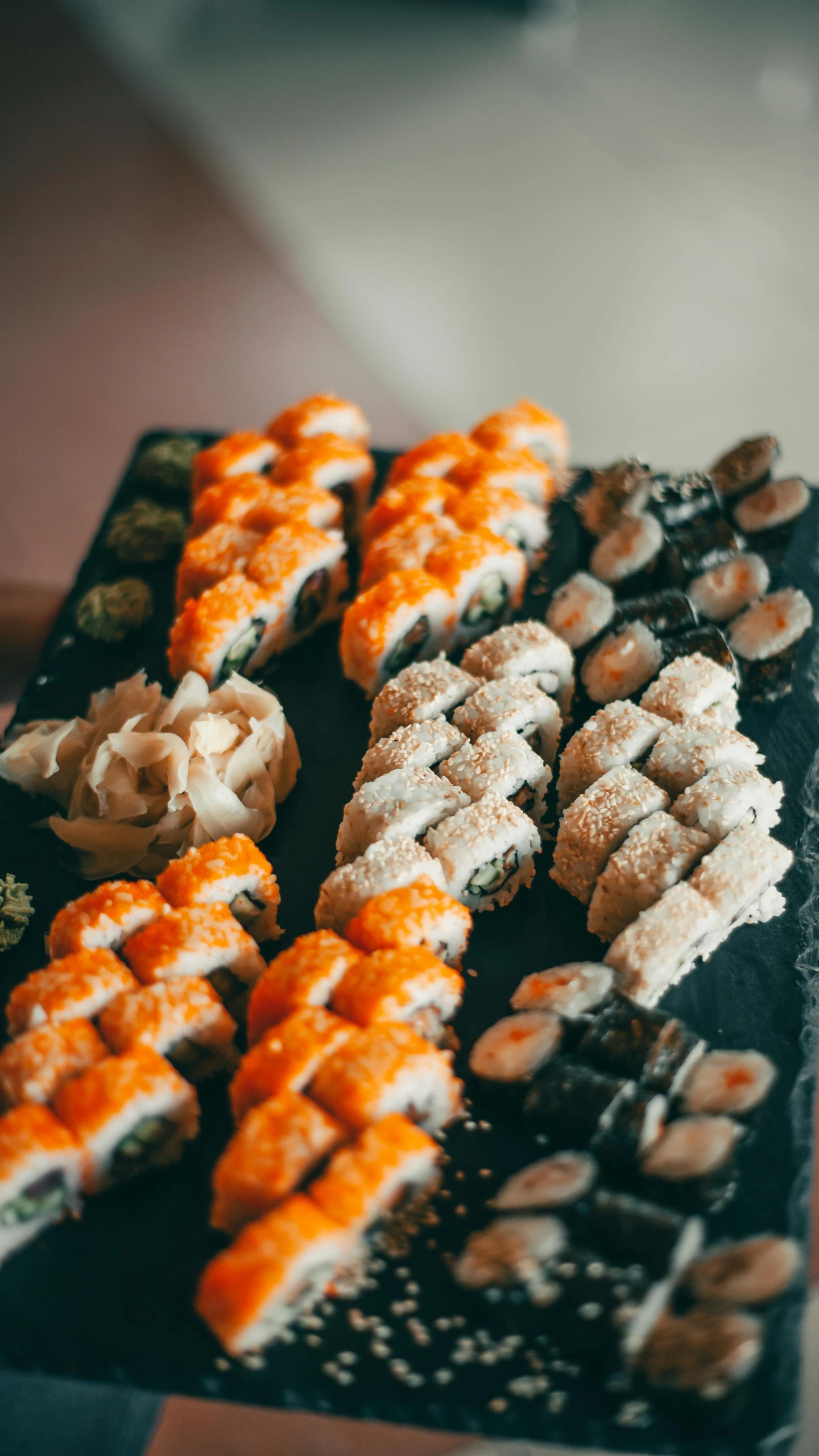 the food on this tray includes carrots, rice and wafers