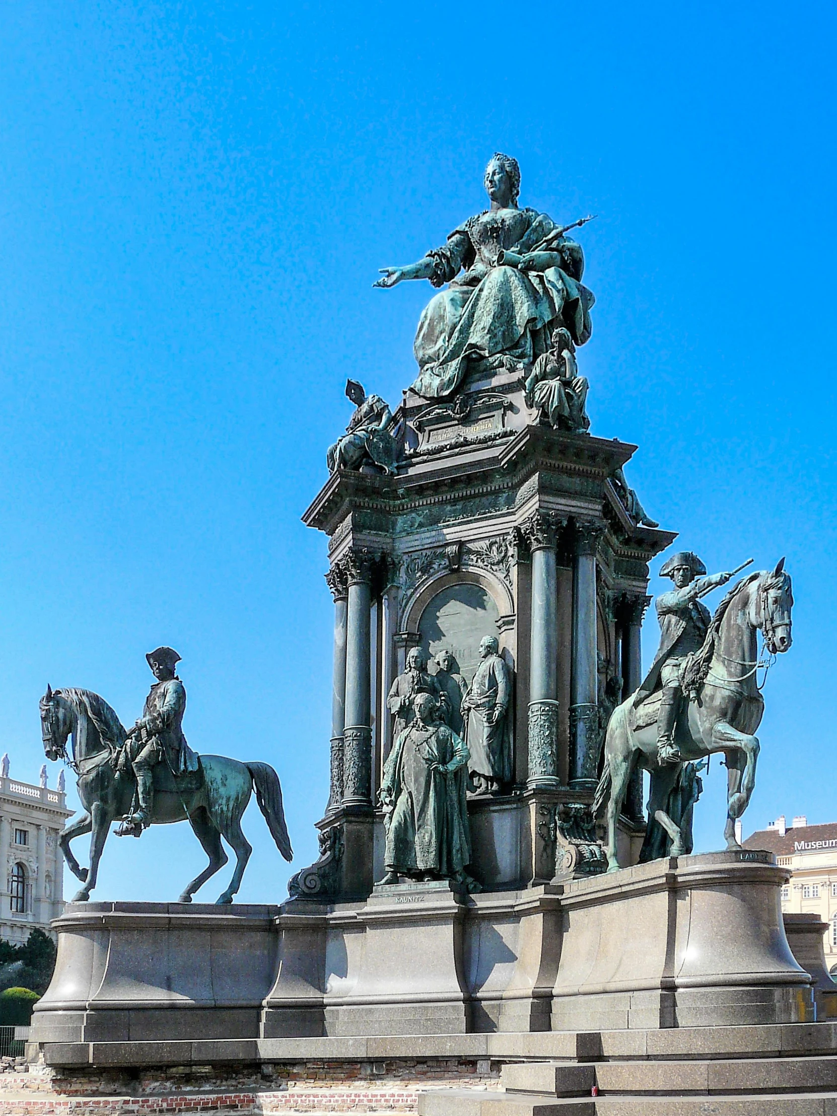 a monument in the middle of some city