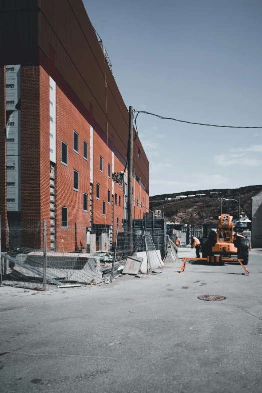 an old picture of an older building being constructed