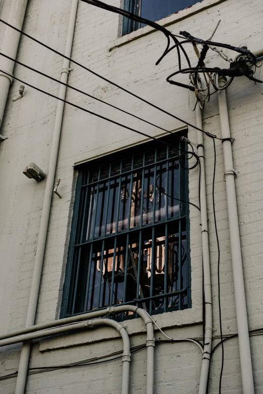 an old building with some wires and wires all over it