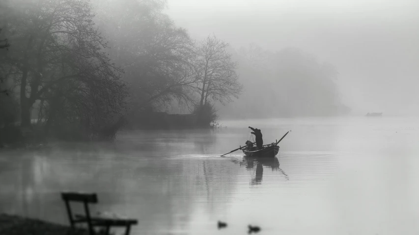 a black and white po of a boat in the water