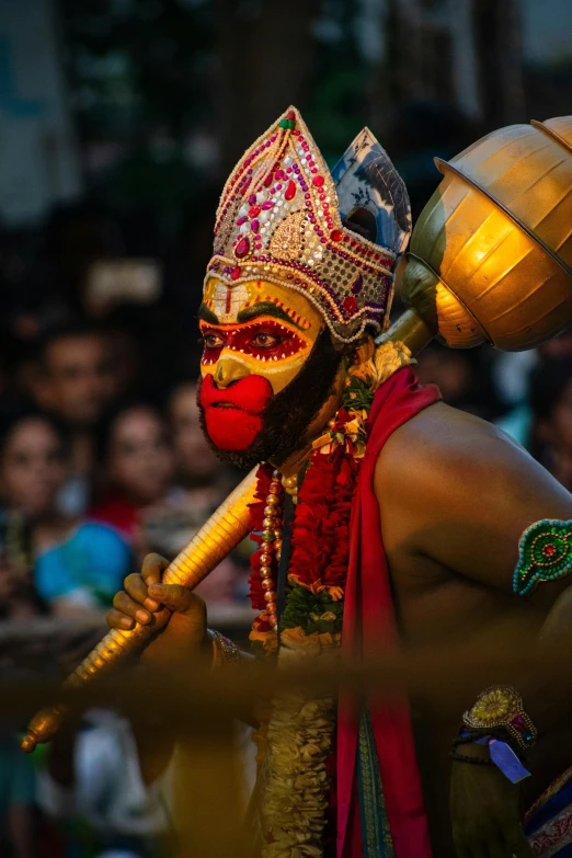 a man wearing a mask and holding a sword