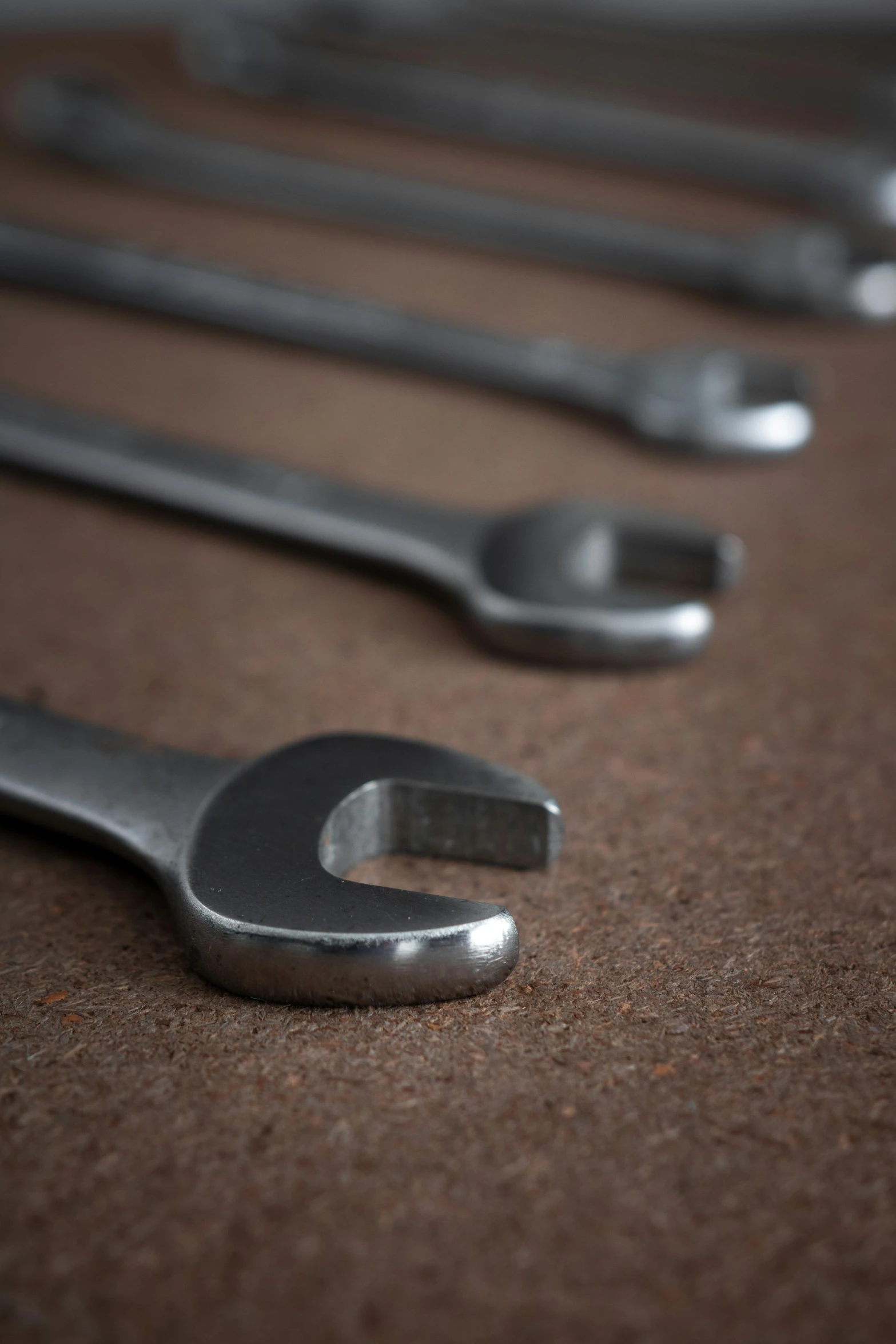 closeup of some wrenches and a wrench handle