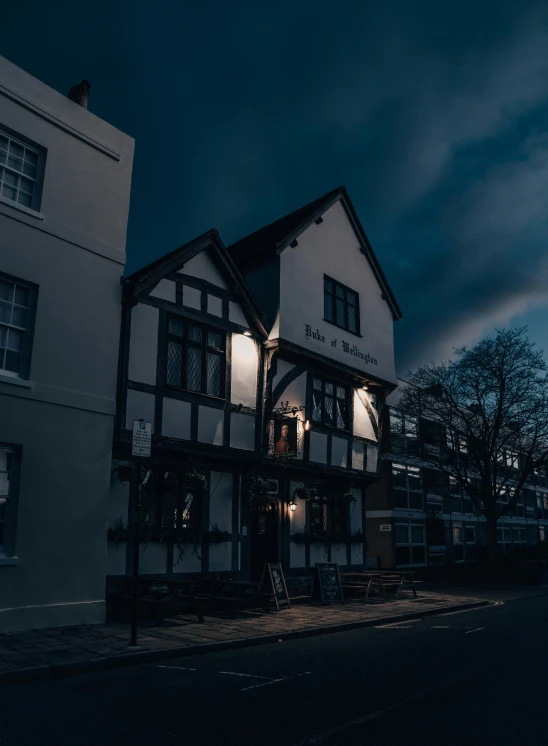 building with a window at night on the side