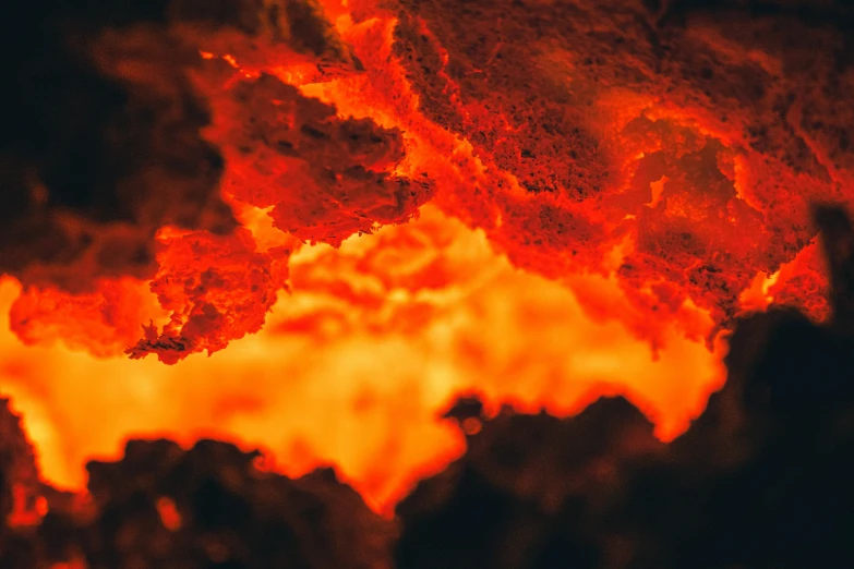 a fire pit has bright yellow orange smoke