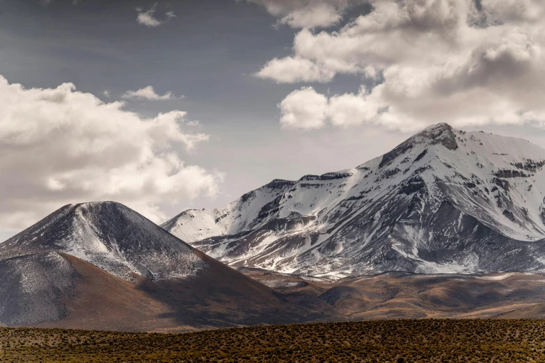 there are many mountain tops in the field