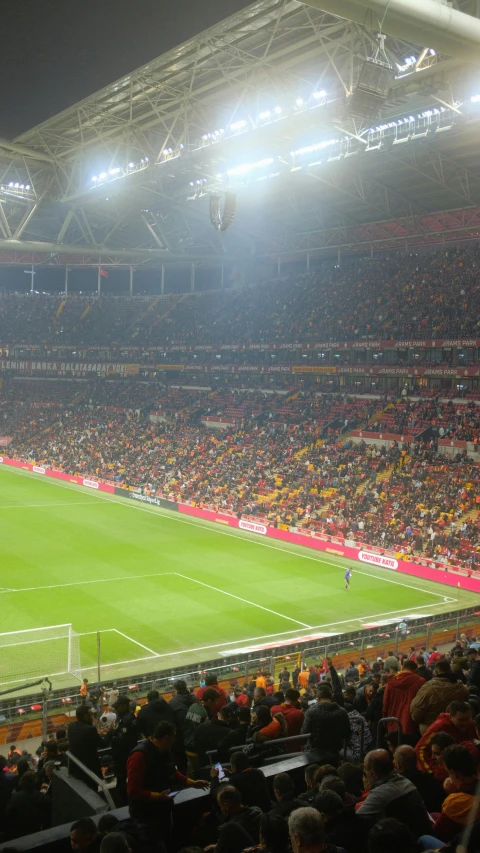 stadium during a soccer game with lots of spectators