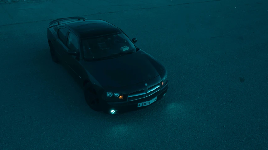 an suv parked in a parking lot at night