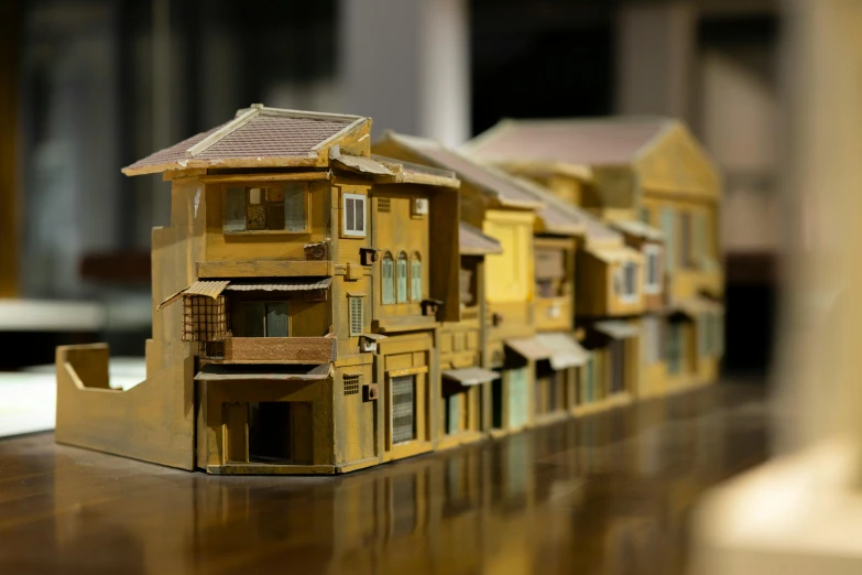 a model of a large building in yellow