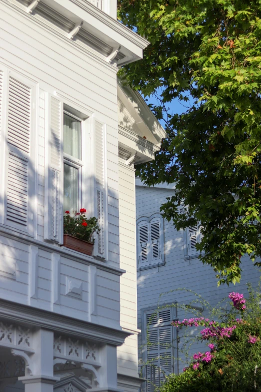 an ornately painted building with some white windows