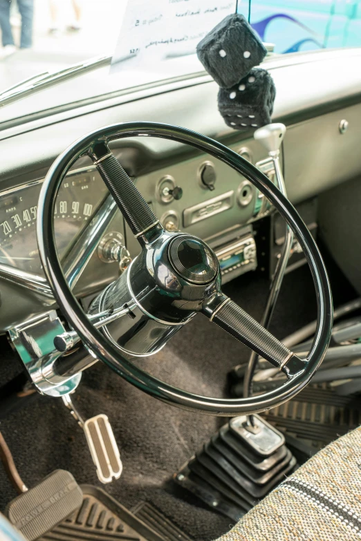 the steering wheel, dash board and dashboard of an old car