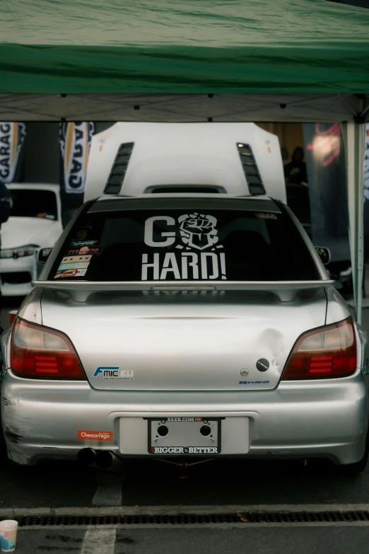 the back end of an automobile, with a marquee on it