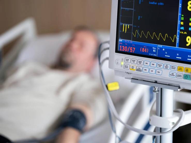 a patient being hooked up to medical monitors