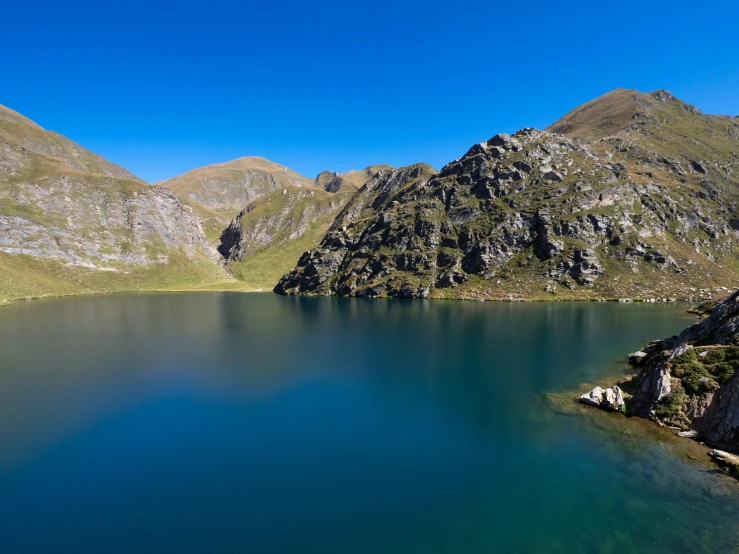 a large body of water sitting between two mountains