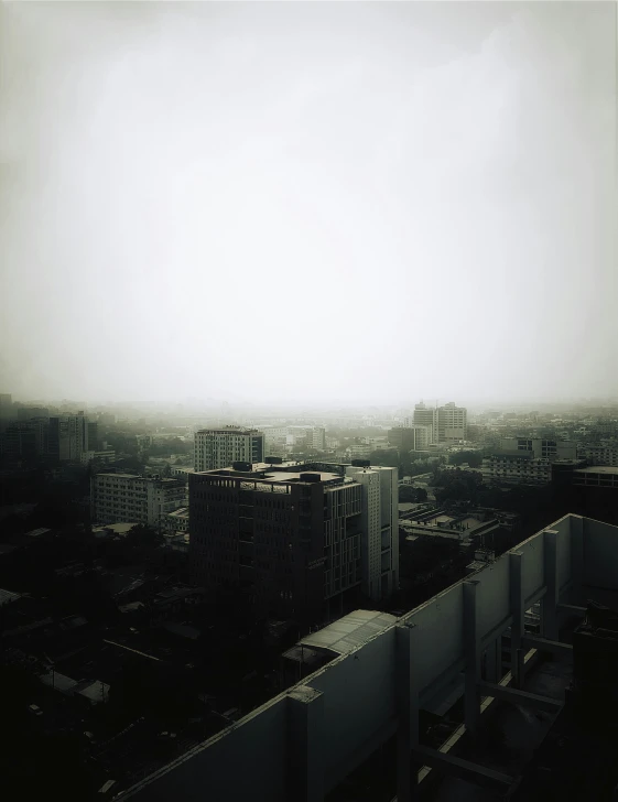 a view of a building from the sky with buildings all around it