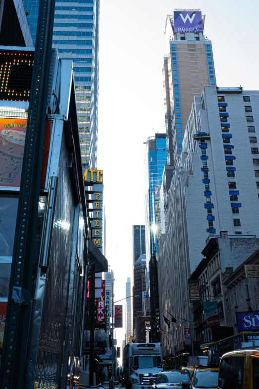 a city street filled with lots of tall buildings