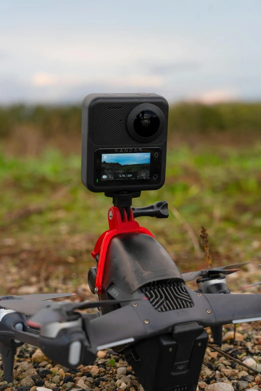 an aerial camera attached to a remote controlled aerial car