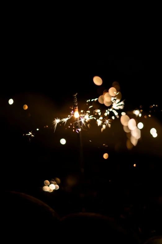 a lit up fireworks in the dark