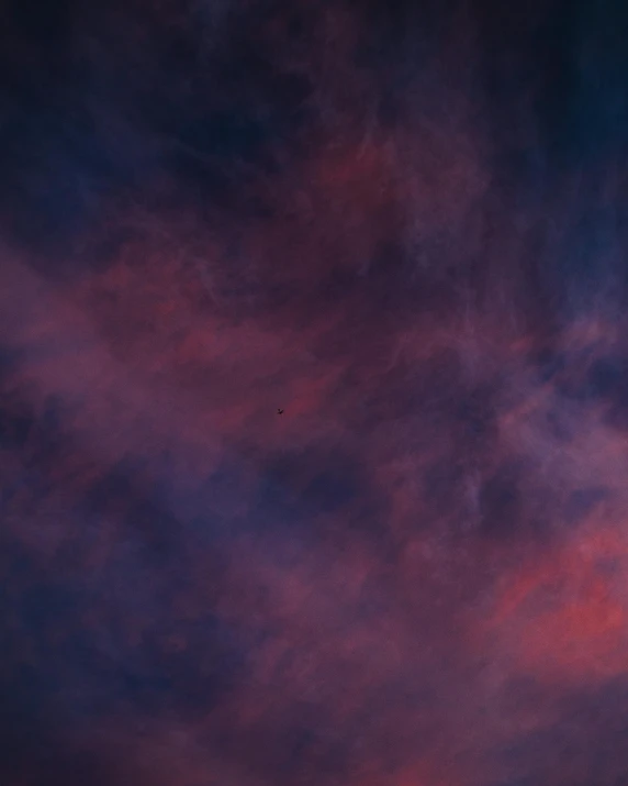 this is an image of a dark blue and pink sky