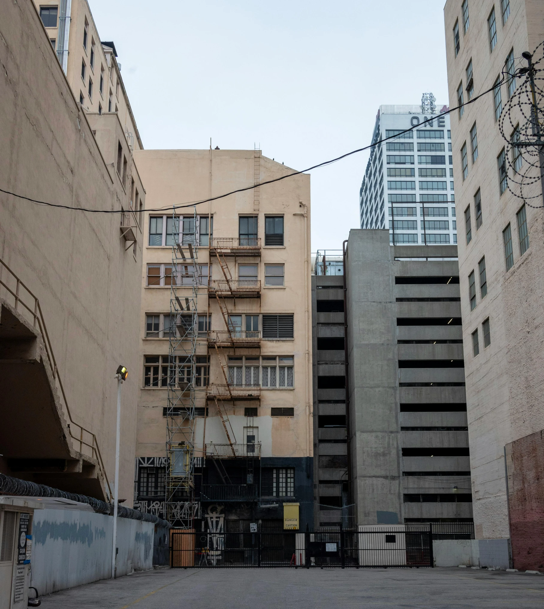 a large fire escape near some buildings in the city