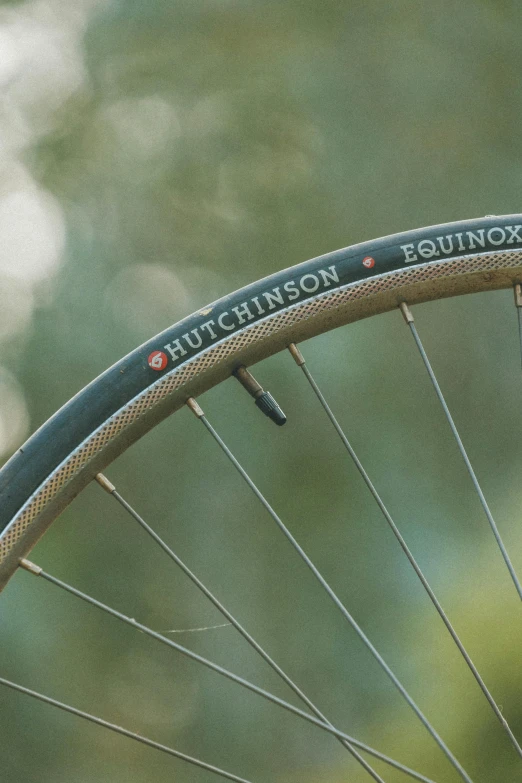 a bike wheel has the name of a person on it