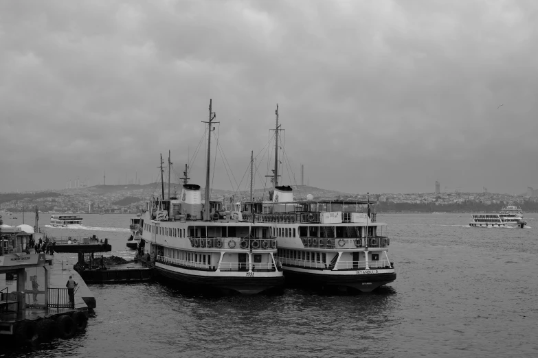 two large boats that are sitting next to each other