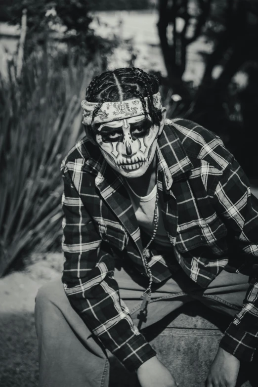 a skeleton wearing a bandana, and a face painting