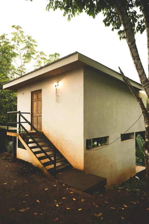 a house sits on top of a mountain