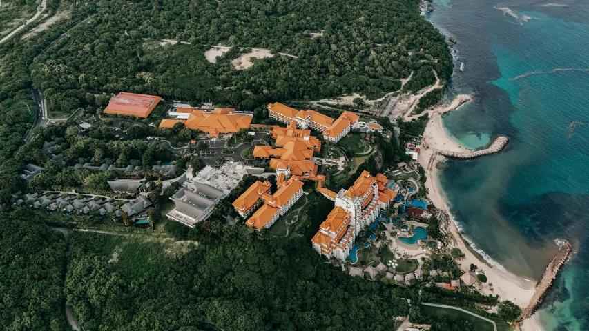 a aerial view of a beautiful resort and a beach