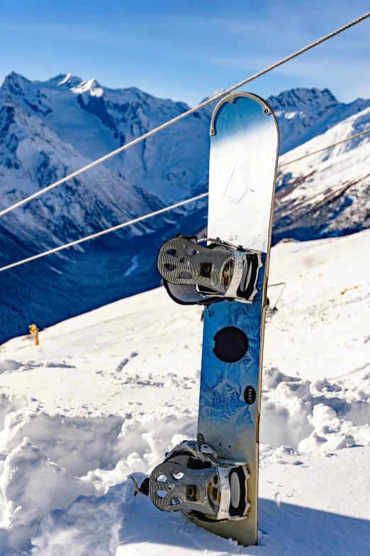 there is a snowboard attached to the ski's pole