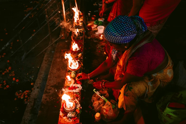 the women are making food with the lights on