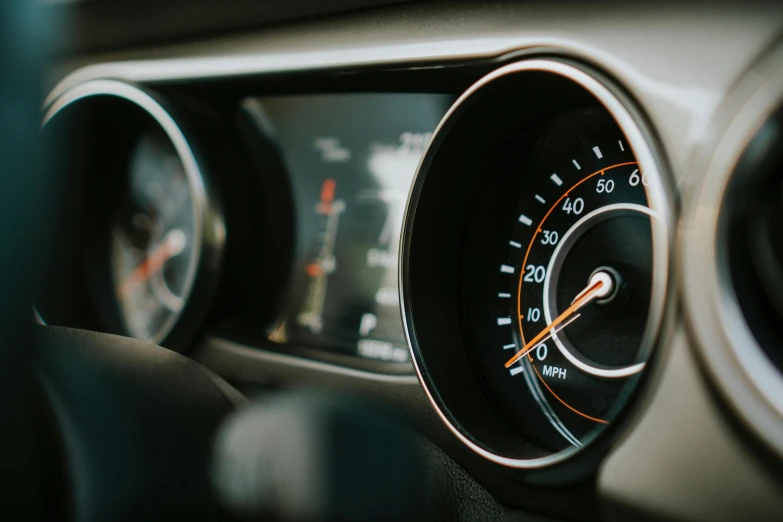 a close up s of the meter and instrument in a vehicle