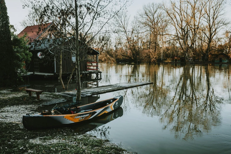 two boats at the dock surrounded by water