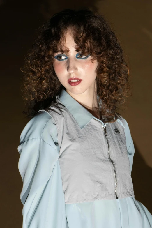 a female model with wavy hair with dark eyes