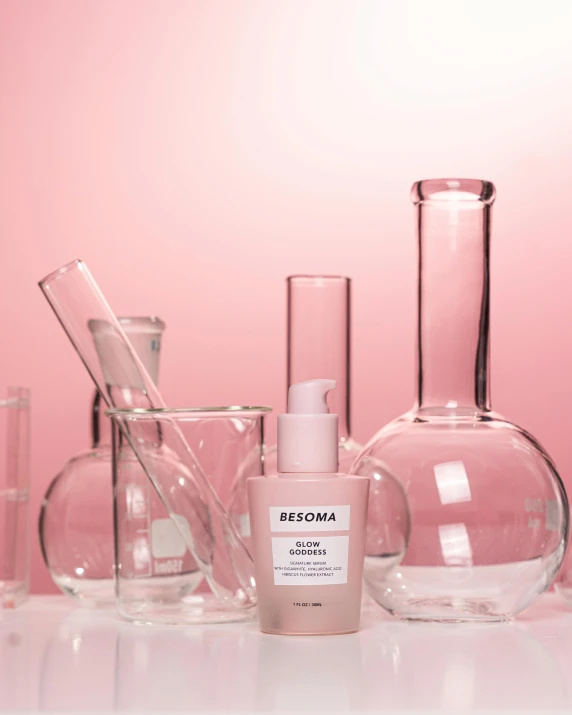 a table filled with many different clear glassware