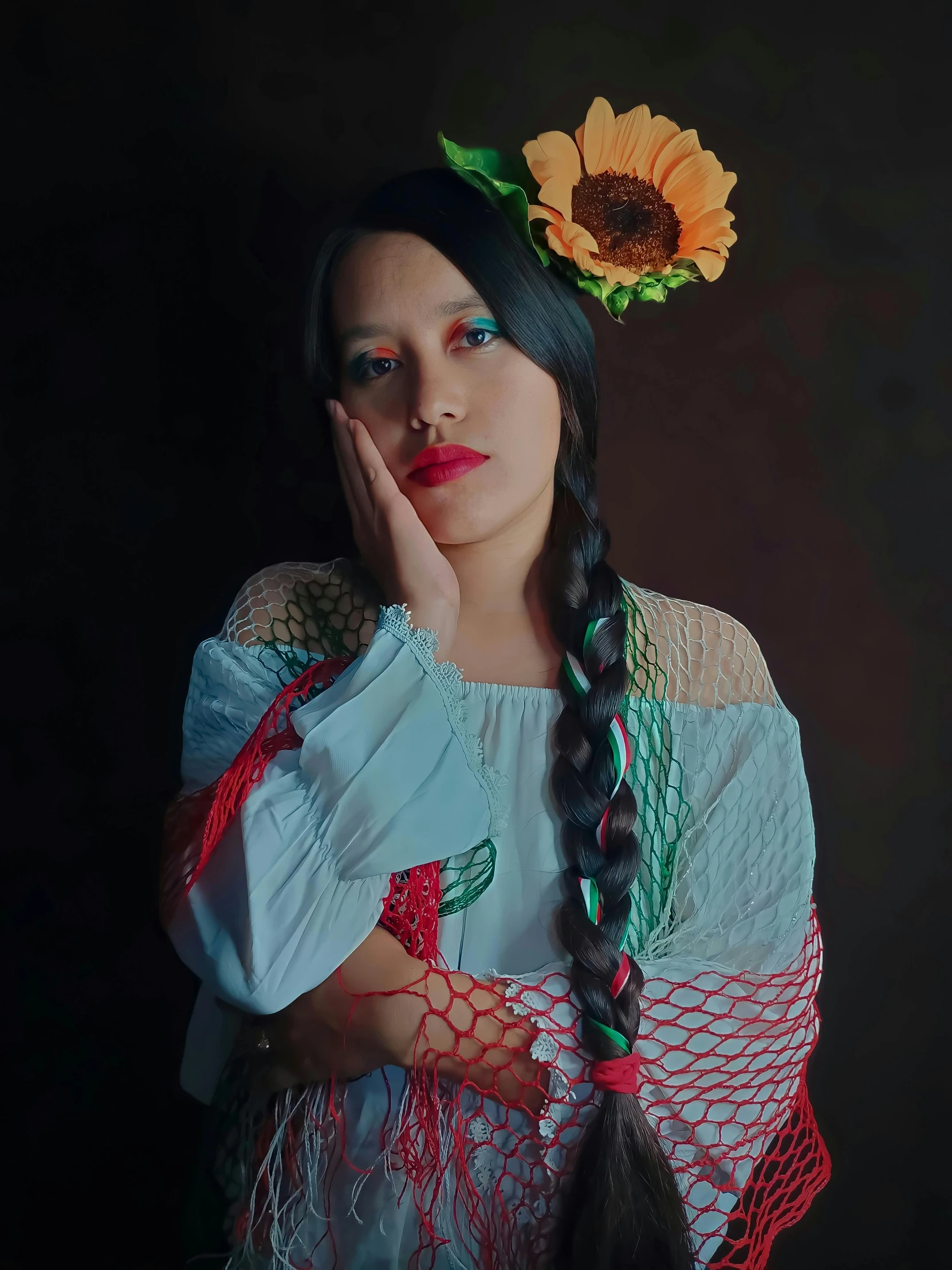 a woman with a flower in her hair