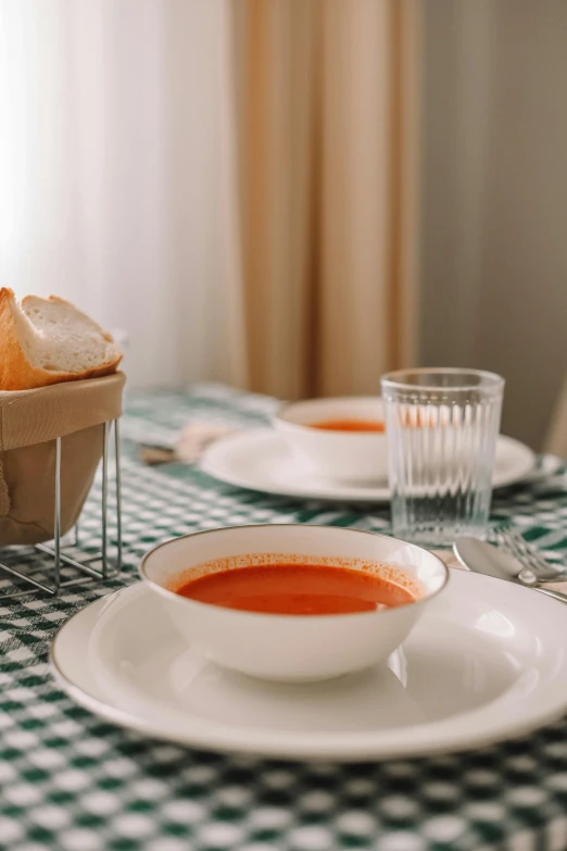 a close up of a plate of soup on a table