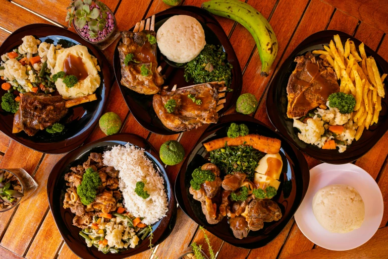 four plates filled with food on a table